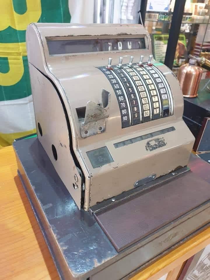 cash register button push