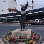 Perla Siedle Gibson, known as the "Lady in White," was a South African soprano and artist who became an iconic morale-booster for Allied troops during World War II in Durban, South Africa.