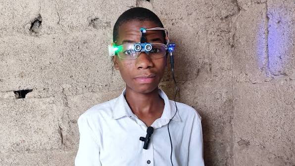 Khalifa Aminu, a 20-year-old self-taught inventor from Kano, Nigeria, is developing AI-powered smart glasses (most recently referred to as Glass V2 or an AI Smart Glass) designed specifically to help blind and visually impaired people navigate independently. 0 (0)