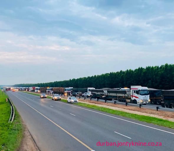 The severe truck congestion on the N2 near Richards Bay (including at the R34 offramp and southbound lanes) is a multi-year, systemic logistics crisis driven primarily by the collapse of South Africa’s rail freight system,