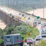 The R190 million emergency rehabilitation of the uMzimkhulu (Mzimkhulu) River Bridge on the R102 near Port Shepstone has stretched from a planned six-month job into a multi-year saga marked by structural complexity, repeated stoppages over non-payment, cash-flow problems at the KZN Department of Transport, weather and technical setbacks, and significant local economic disruption