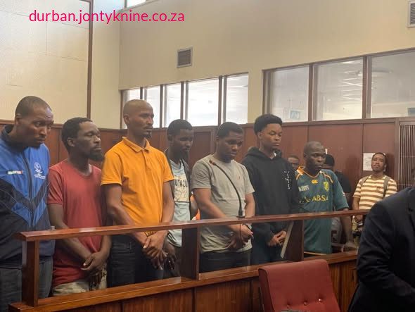 Fifteen individuals (or fourteen in some reporting, with one related accused previously released on a warning) who were arrested in connection with violent protests in the Durban Central Business District (CBD) and surrounding suburbs were granted bail of R500 each by the Durban Magistrate’s Court. The group consisted largely of young students. Charges included public violence, malicious injury to property, hindering traffic, and possession of dangerous weapons.