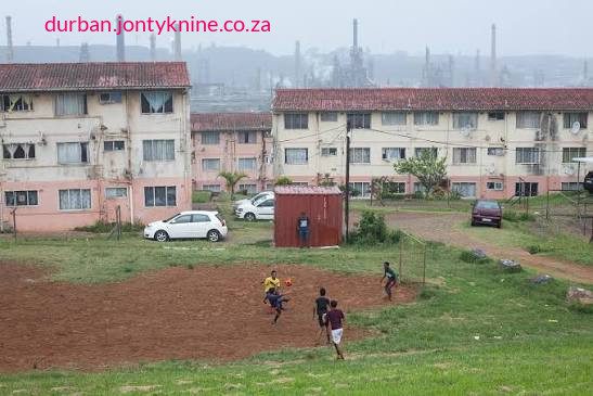 Two men were shot dead in Hime Street, Wentworth (a suburb south of Durban, KwaZulu-Natal, South Africa) in the early hours of Friday, 9 October 2026, while sitting outside one of their houses. The wife of one victim has publicly blamed ongoing gang violence in the area